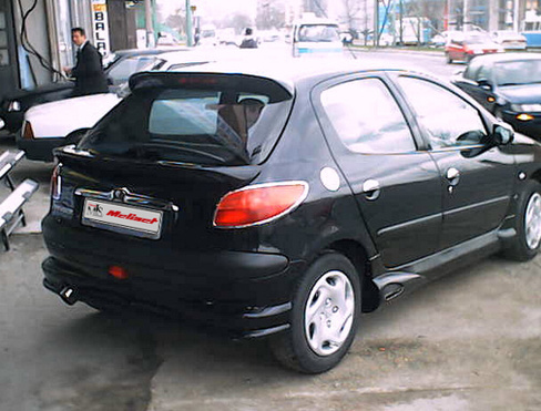 Спойлер нижний под покраску (стекловолокно) Peugeot 206 1998-2012